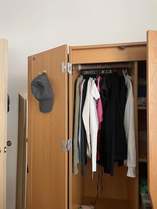 https://sp-ao.shortpixel.ai/client/to_webp,q_lossy,ret_img,w_500,h_667/https://organizenvy.com/wp-content/uploads/2023/08/Dorm-Room-Storage-Armoire.jpg