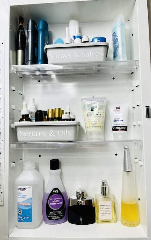 Organize a messy room: use labeled trays in the medicine cabinet.