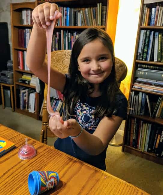 slime being played with by a young girl.