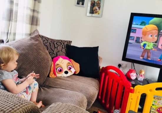 Baby girl watching PJ Masks: Time to be a Hero