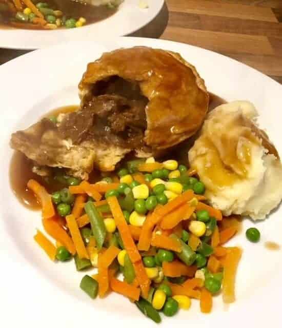 Pukka Pies with mash and vegetables
