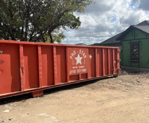 Pro Star Roll-Off 40 Yard Dumpster in a construction site house build project