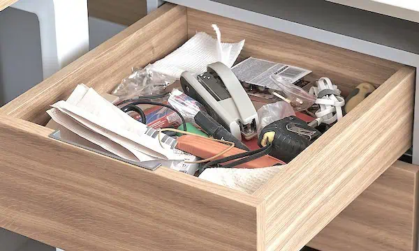 The first step to organize desk drawers: declutter