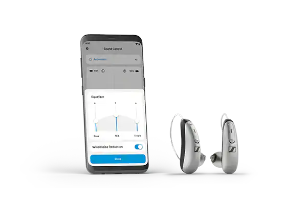 Advanced hearing aids with smartphone control for personalized sound adjustment, featuring wireless connectivity and discreet design for improved hearing clarity and comfort.
