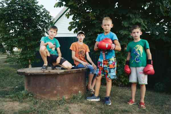 boys wearing boxing gloves