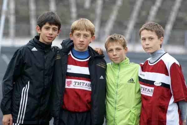 a group of boys standing together