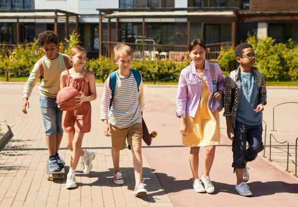 young girls bnd boys walking together