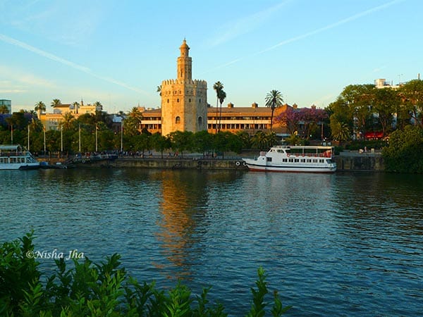 Golden tower seville or Torre del Oro Sevilla at night @www.lemonicks.com