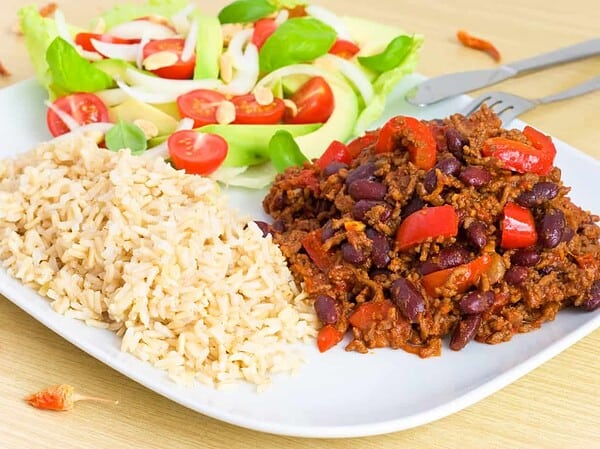 chilli con carne with rice and salad