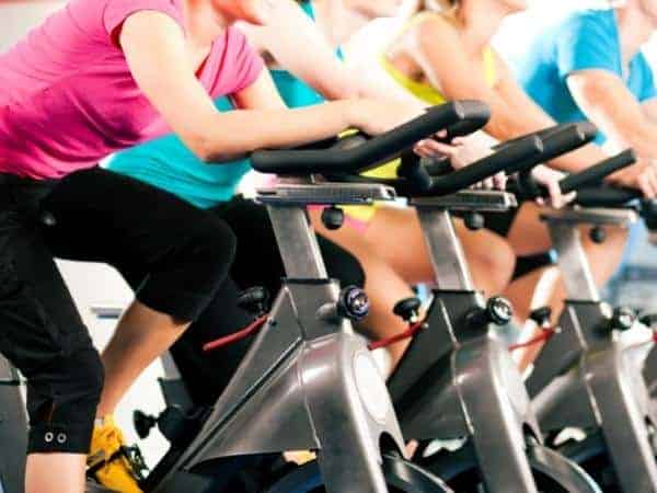 group of ladies on spinning bikes