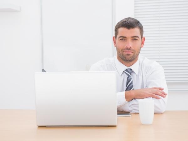 man sitting at a desk