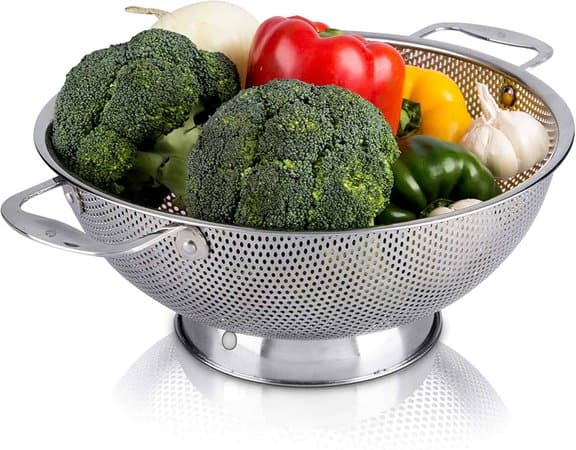 metal colander full of vegetables