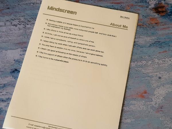 Mindscreen About Me document on blue background