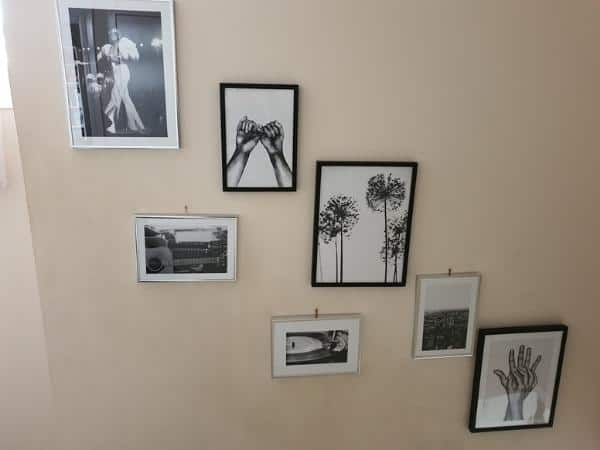 Closeup of framed wall art on wall