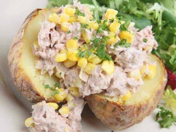 A close up of a plate of food, with Potato and Cheese