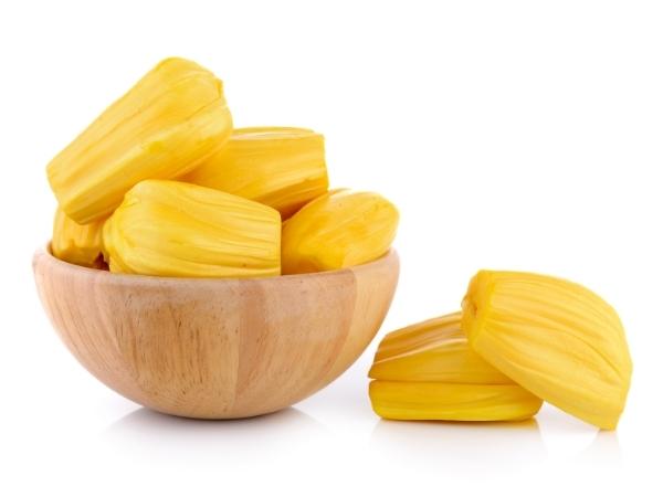 A wooden bowl with ripe jackfruit