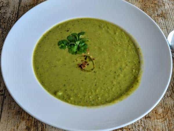 pea soup in a white bowl.