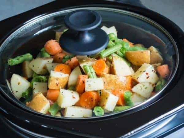 potatoes and vegetables in the slow cooker