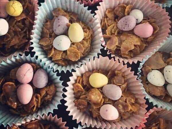 cornflake cakes with mini eggs on top.