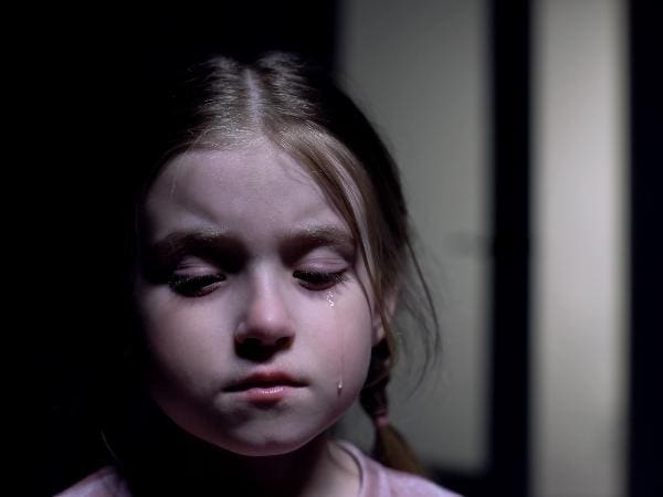 young girl crying