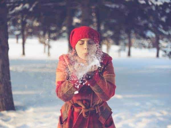 A woman standing in the snow