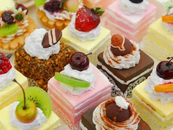 A table with a birthday cakes