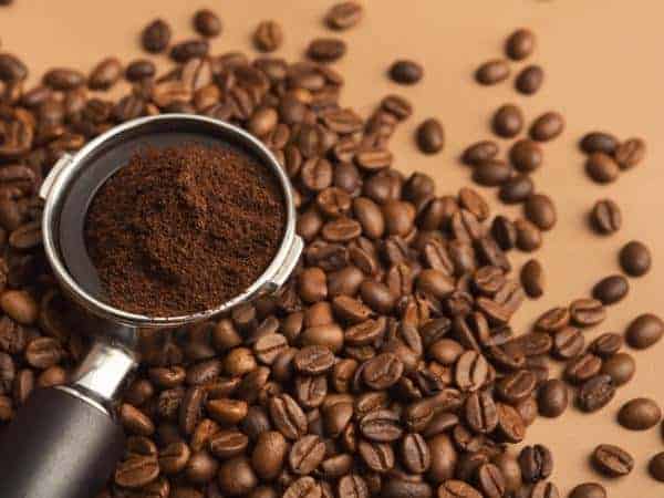 coffee beans and part of a coffee machine