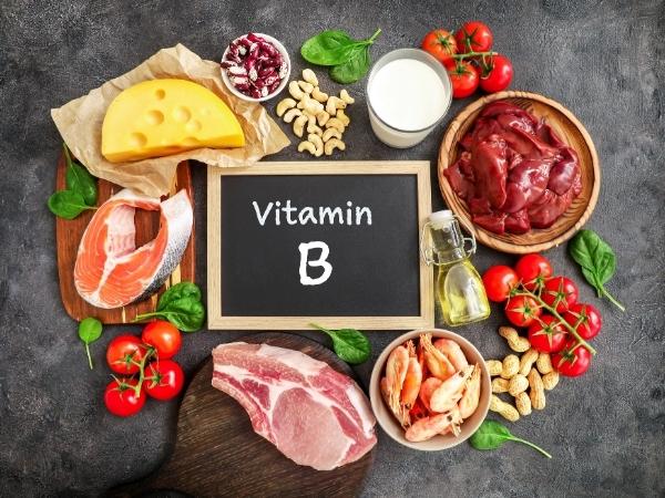 vitamin b selection of foods surrounding chalkboard with viatmin b written on in chalk