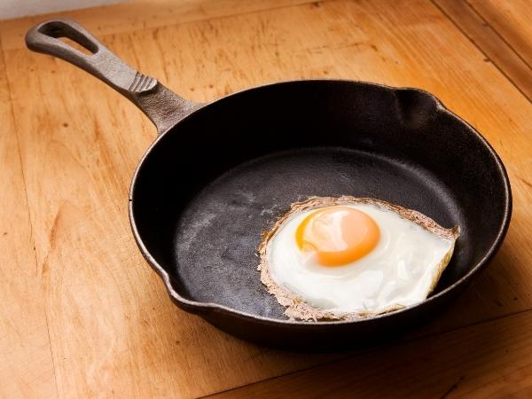 frying pan with fried egg inside