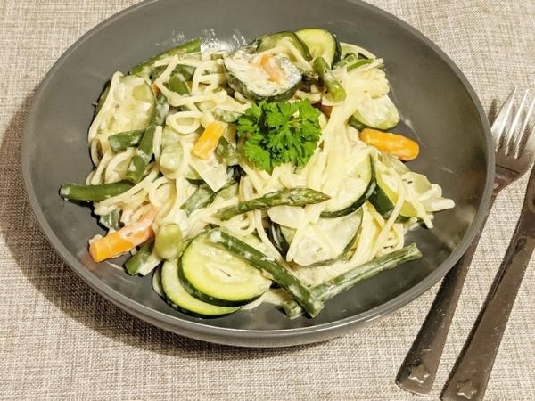 Slimming world spaghetti primavera in a grey bowl