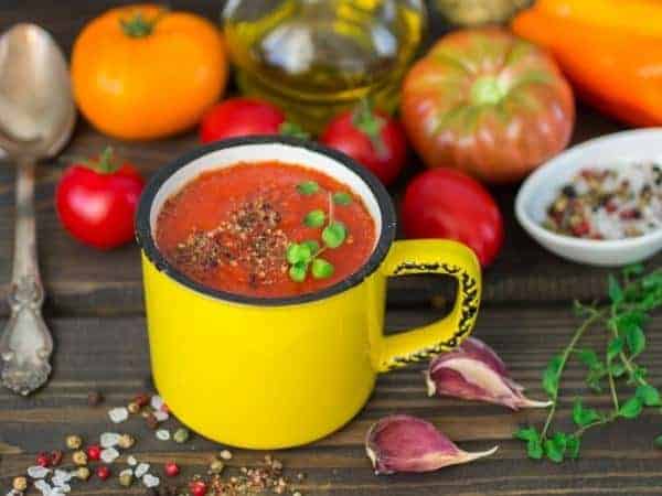 soup in a mug with fruit