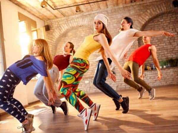 A group of people dancing together