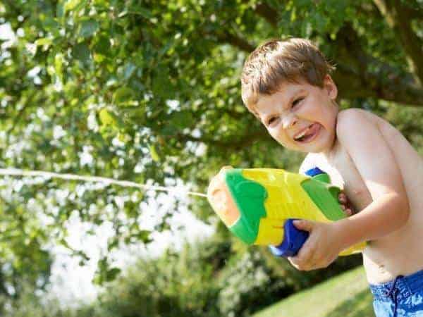 boy with a water pistol