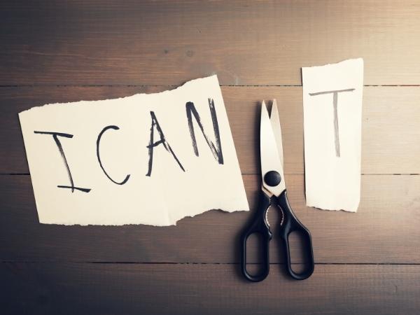 I can written on a piece of paper and a t on another piece with scissors having cut it in half.