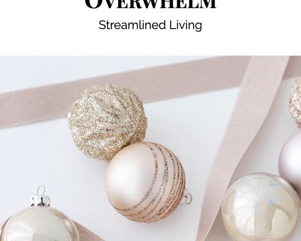 rose gold and glitter Christmas bulb ornaments and ribbon n white background