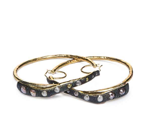 Photo of pair of earrings by Ricky Owens in bronze and diamonds