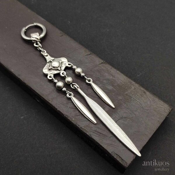 Long tribal earring by Antikuos jewellery, close-up