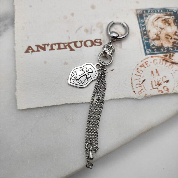 Shield and chains medieval gothic earring by Antikuos jewellery, close-up