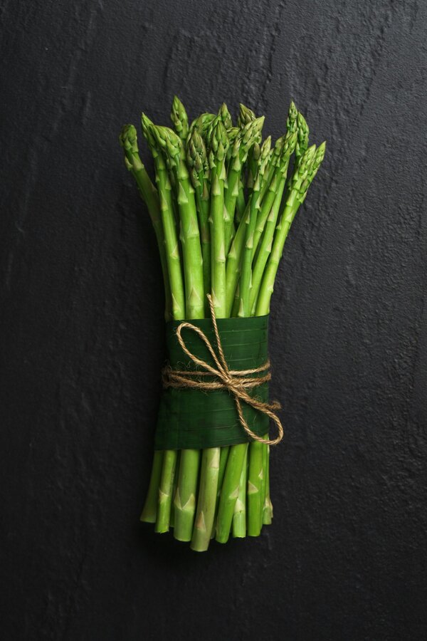 tender green spears of asparagus ‘Connover’s Colossal’, a traditional heritage variety grown for long-term harvests and reliable growth