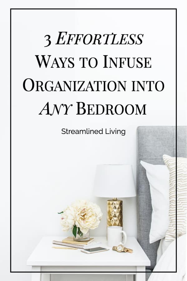 organized night stand next to bed with grey headboard