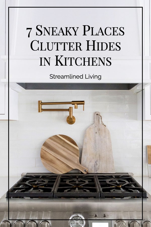 subway tiled backsplash with wooden cutting board on top of gas stove