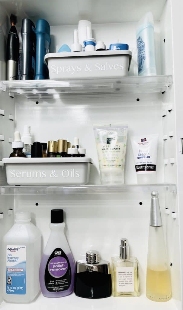 Organized Bathroom Medicine Cabinet with small labeled bins for bottles