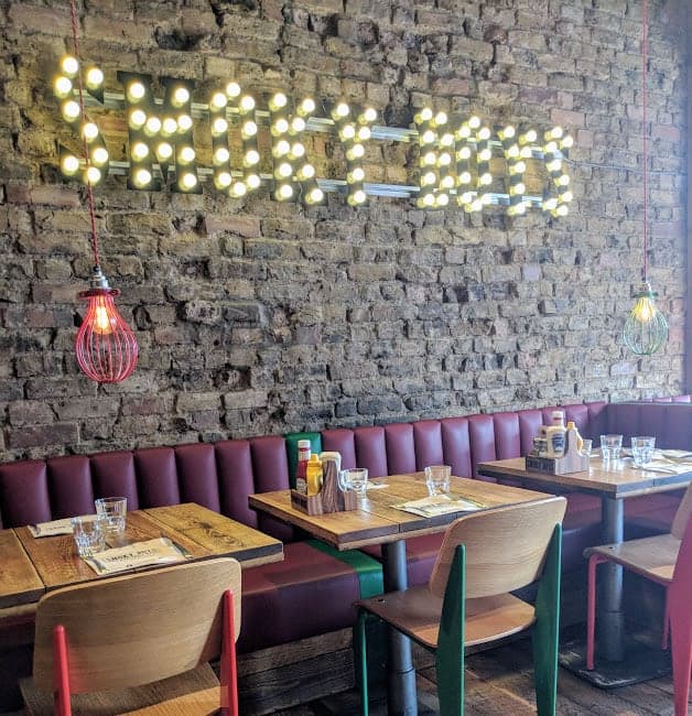 Restaurant tables in Smoky Boys in Watford