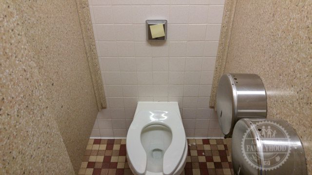 Life Hack Post-It over flush sensor at Disney World bathroom