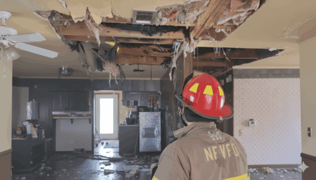 Fire damage interior ceiling and walls after a recent fire incident.