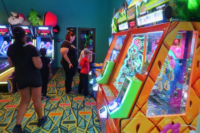 guests play arcade games at the Kartrite Resort