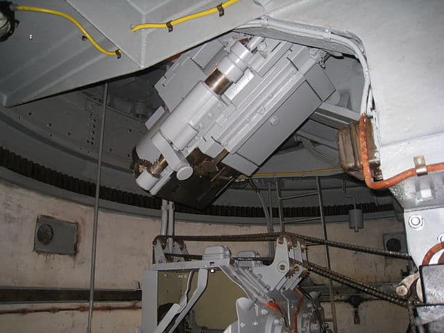 Interior view of the restored Cupola 120 with twin 120 mm guns at Fort Eben-Emael, now open to the public.