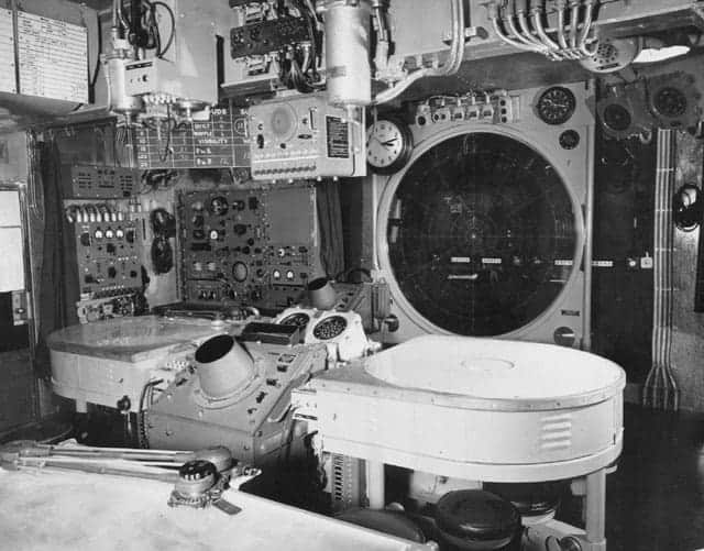 View of the combat information center (CIC) aboard the U.S. light aircraft carrier USS Independence (CVL-22) in World War II.