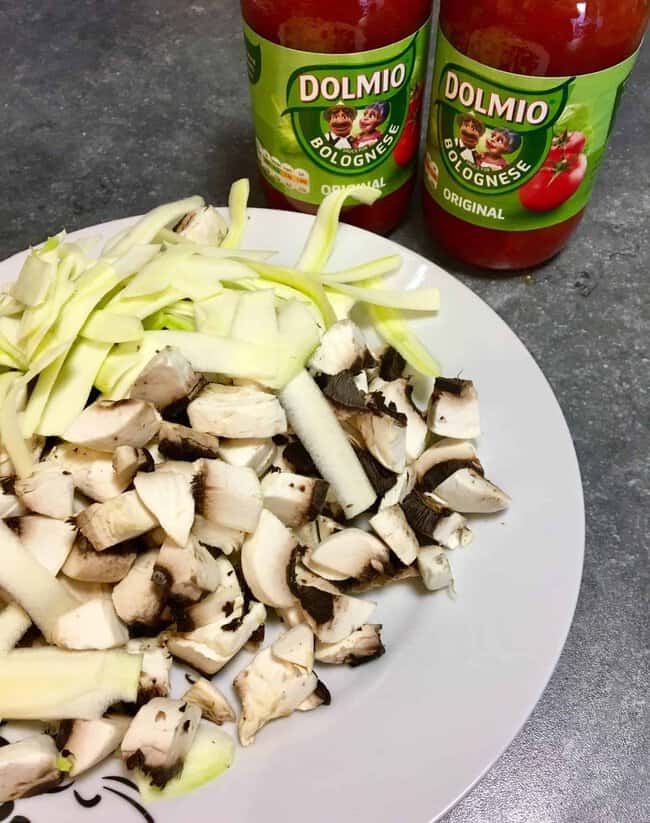 Dolmio Bolognese sauce with a plate of mushroom and courgette