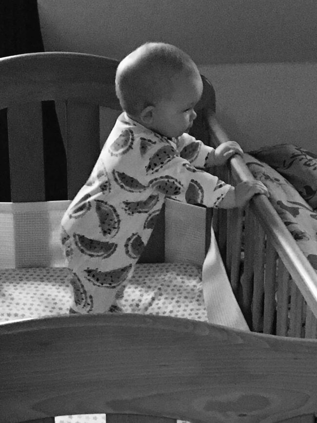 bouncing in her cot - Rachel Bustin